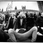 Face-sitting protest outside parliament against sexist porn law. Palace of Westminster, London 2014. Ginger Liu #Photography